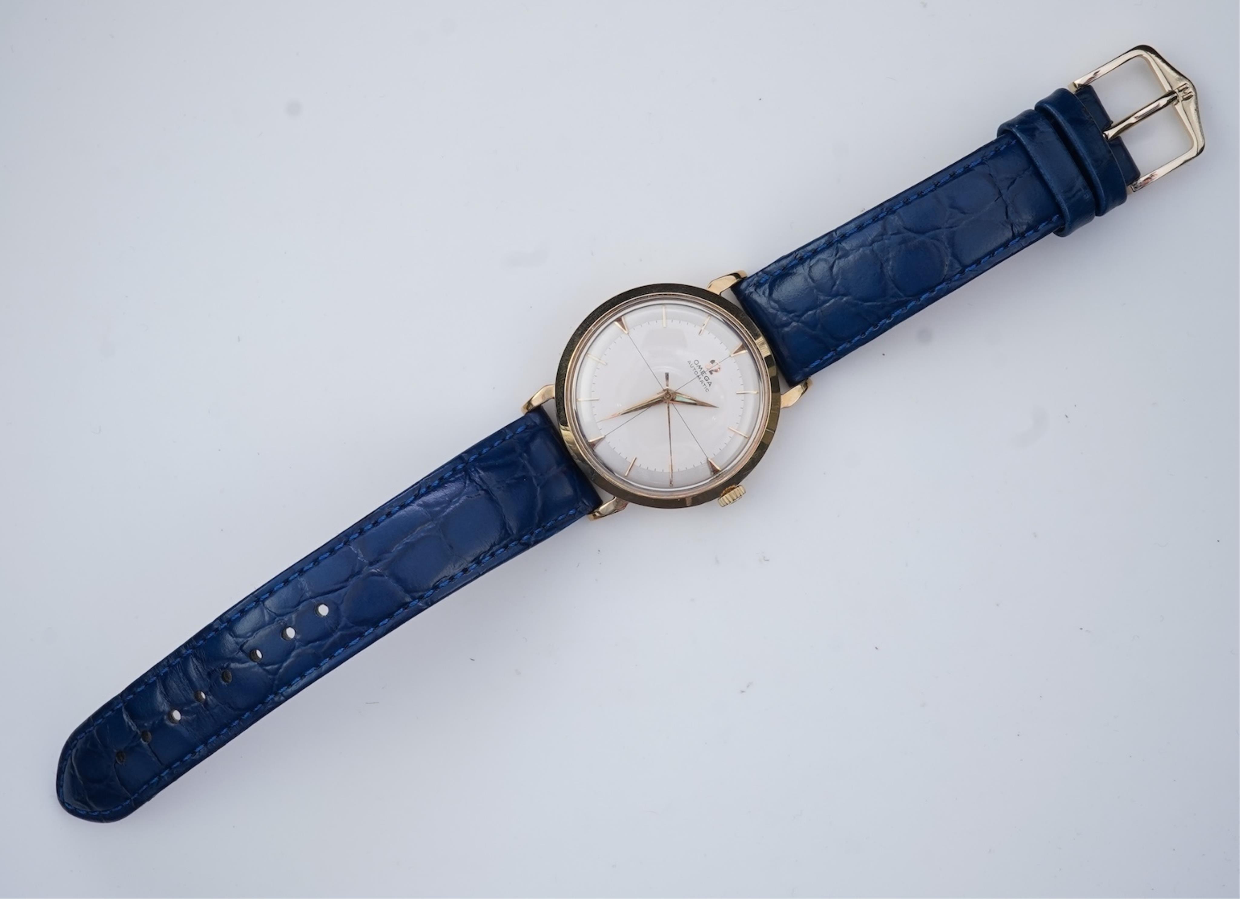 A gentleman's late 1950's 9ct gold Omega Automatic wrist watch
